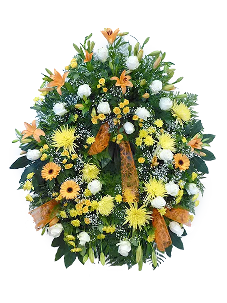 Floristería para funerales. Corona de flores amarillas y blancas sobre hojas verdes